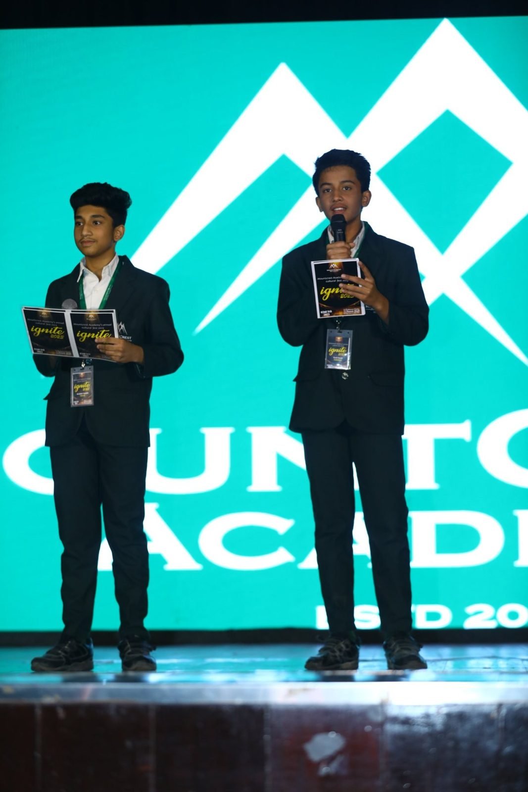 Student hosts on stage at Ignite, the Mountcrest annual cultural fest