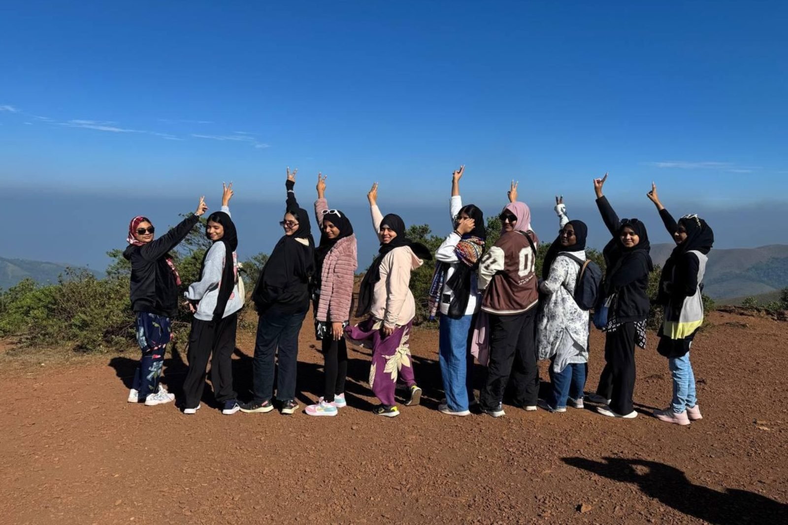 Mountcrest students on a hilltop during a school trip